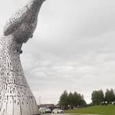 The two protesters began climbing the Kelpies around 5am. Pic: Contributed
