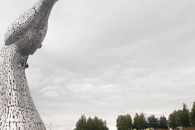The two protesters began climbing the Kelpies around 5am. Pic: Contributed
