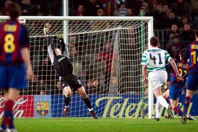 Celtic novice David Marshall pulls off a stunning save from Luis Garcia to cap a man of the match performance as the Parkhead men ousted Barcelona from the UEFA Cup in March 2004. (Photo by Alan Harvey/SNS Group).
