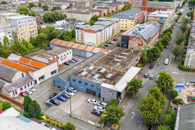 The existing properties on the site off Edinburgh's Leith Walk comprise a mixture of one and two storey office, showroom and warehouse buildings.