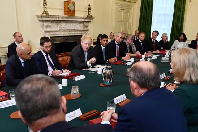 Will Chancellor Rishi Sunak, seen in Cabinet sitting next to Boris Johnson, make amends for his party's economic policies? (Picture: Ben Stansall/PA)