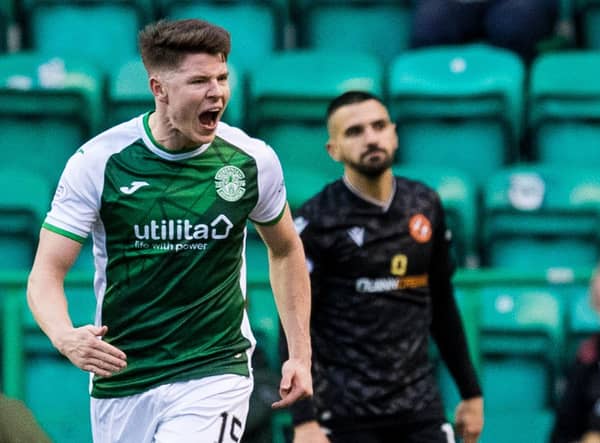 Hibs striker Kevin Nisbet celebrates after scoring to make it 1-1 against Dundee United. (Photo by Ross Parker / SNS Group)