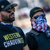 Former leader of the Proud Boys Enrique Tarrio (left), wearing a shirt supporting Derek Chauvin, joins a counter-protest where people gathered to remember George Floyd. Picture: Chandan Khanna/AFP via Getty Images