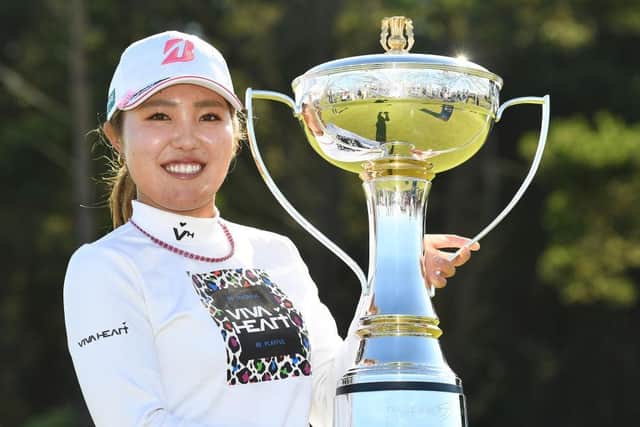 Ayaka Furue poses with the new Trust Golf Women's Scottish Open Trophy after her four-shot win at Dundonald Links. Picture: Mark Runnacles/Getty Images.