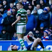Rangers' John Lundstram goes down injured after a challenge from Celtic debutant Alistair Johnston during the 2-2 draw at Ibrox.  (Photo by Craig Williamson / SNS Group)
