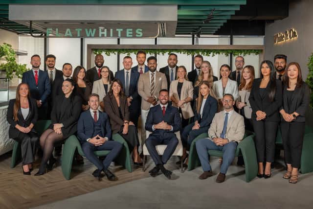 Calum White with team members of White & Co Real Estate.