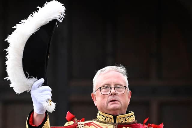 The Lord Lyon King of Arms, Dr Joseph Morrow, will take part in the King's Procession to Wesminster Abbey on Saturday with six officers from the Court of the Lord Lyon, Scotland's heraldic authority.  (Photo by Neil Hanna / AFP)
