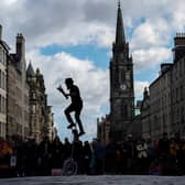 A juggler performs for tourists on Royal Mile during the Edinburgh Festival Fringe. Picture: Jeff J Mitchell/Getty Images