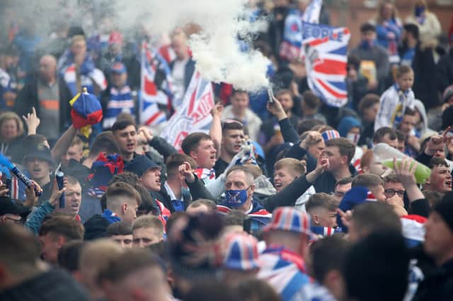 Rangers fans outside the ground before the Scottish Premiership match at Ibrox Stadium, Glasgow. PA.