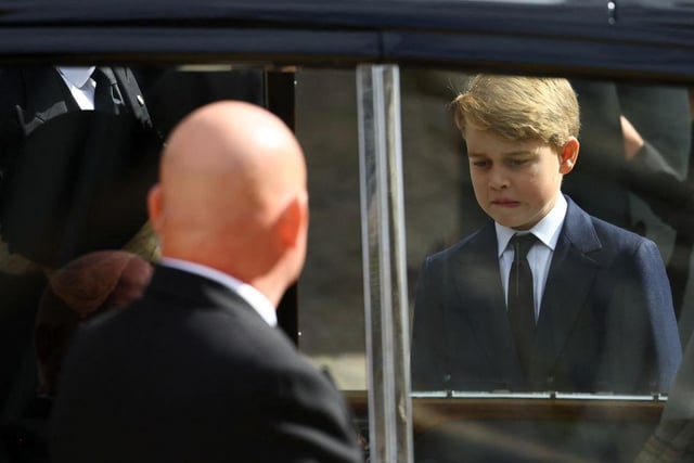 Prince George of Wales leaves after the State Funeral of Queen Elizabeth II.