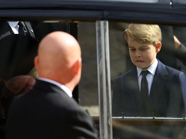 Prince George of Wales leaves after the State Funeral of Queen Elizabeth II.