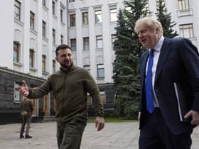 Handout photo issued by the Ukrainian Presidential Press Office of Prime Minister Boris Johnson (right) meeting Ukrainian President Volodymyr Zelensky in Kyiv, Ukraine. Picture date: Saturday April 9, 2022.