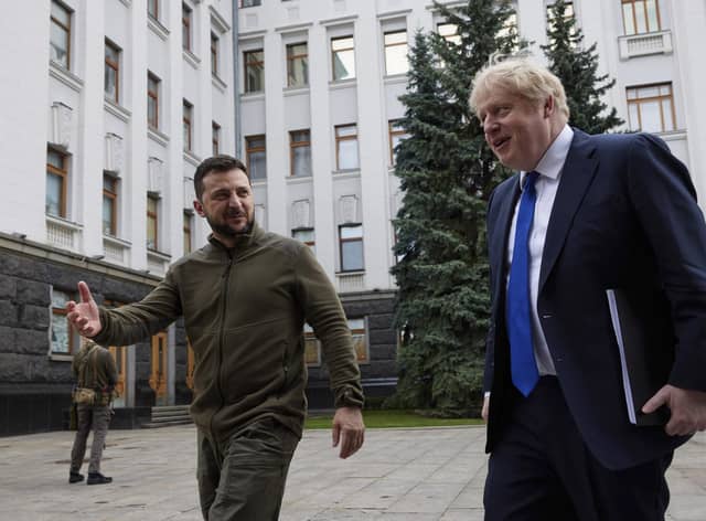 Handout photo issued by the Ukrainian Presidential Press Office of Prime Minister Boris Johnson (right) meeting Ukrainian President Volodymyr Zelensky in Kyiv, Ukraine. Picture date: Saturday April 9, 2022.