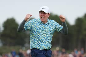 Bob MacIntyre  celebrates after becoming the first home plauer in 25 years to win the Genesis Scottish Open at The Renaissance Club. Picture: Andrew Redington/Getty Images.