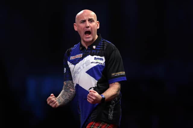 Alan Soutar of Scotland celebrates his victory over Danny Noppert at The Cazoo World Darts Championship at Alexandra Palace. (Photo by Mike Owen/Getty Images)