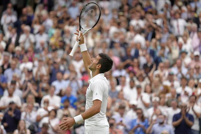 Novak Djokovic celebrates his opening-day victory at Wimbledon.