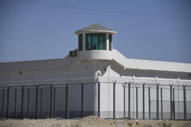 A watchtower at a high-security facility near what is believed to be a re-education camp where mostly Muslim ethnic minorities are detained, on the outskirts of Hotan, in China's Xinjiang region (Picture: Greg Baker/AFP via Getty Images)