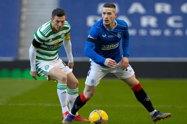Celtic's Callum McGregor keeps a close eye on Rangers winger Ryan Kent during the last Old Firm clash