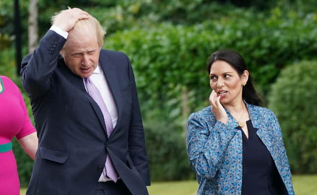 Boris Johnson and Home Secretary Priti Patel need to reconsider their plans to change the Official Secrets Act (Picture: Yui Mok/pool/Getty Images)