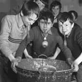 The Tweedie Memorial Boy's Club Hallowe'en party showing boys dookin' for apples in 1967.
