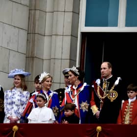 Members of the Royal family on Buckingham Palace balcony including the Prince and Princess of Wales. Image: Simon James Smith