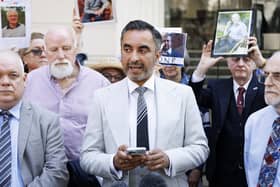 Aamer Anwar (centre), lead solicitor for the Scottish Covid Bereaved group, speaks outside the UK Covid-19 Inquiry at Dorland House in London. Picture: Belinda Jiao/PA Wire