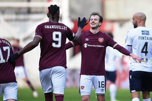 Hearts goalscorers Andy Halliday and Armand Gnanduillet.