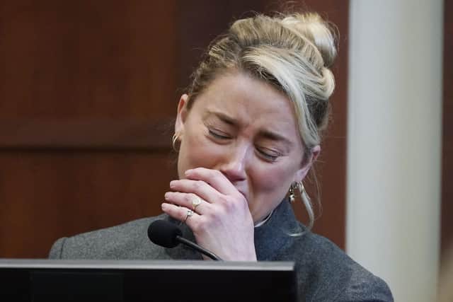 Actor Amber Heard testifies in the courtroom at the Fairfax County Circuit Courthouse