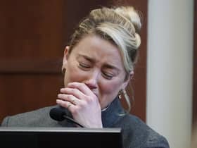 Actor Amber Heard testifies in the courtroom at the Fairfax County Circuit Courthouse