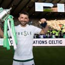 Celtic's Greg Taylor with the Scottish Cup trophy after the 3-1 win over Inverness at Hampden. (Photo by Craig Williamson / SNS Group)