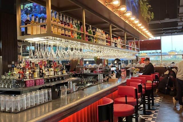 TGI Fridays is famous for having long and glamorous bars in their restaurants