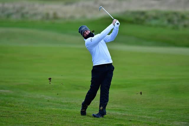 Marc Warren  plays his second shot on the 10th hole during the second round of the Scottish Championship presented by AXA at Fairmont St Andrews. Picture: Mark Runnacles/Getty Images