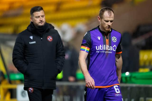 LIVINGSTON, SCOTLAND - DECEMBER 05: Dundee United's Mark Reynolds (R) and coach Thomas Courts at full time during the Scottish Premiership match between Livingston and Dundee United at the Tony Macaroni Arena on December 05, 2020, in Livingston, Scotland. (Photo by Ross Parker / SNS Group)