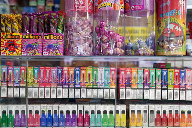 Disposable vapes of varying flavours on sale in a store. Vapes should be sold in plain packages to reduce their appeal to children, a new study suggests. Picture: Jacob King/PA Wire