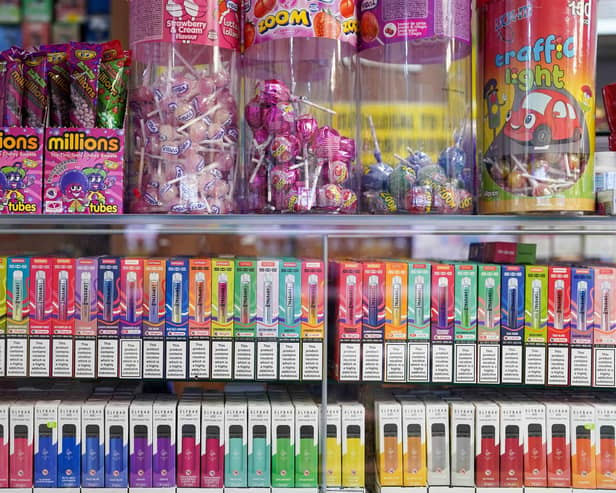 Disposable vapes of varying flavours on sale in a store. Vapes should be sold in plain packages to reduce their appeal to children, a new study suggests. Picture: Jacob King/PA Wire