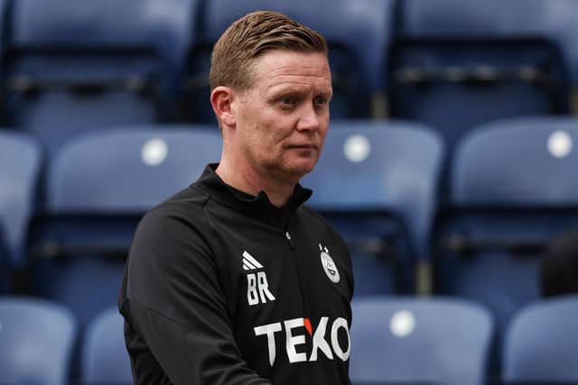 Aberdeen boss Barry Robson hailed the arrival of defender Slobodan Rubezic.