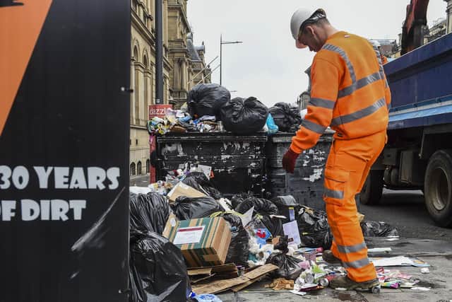 Edinburgh Council refuse workers clean up after the end of strike action in the city (Picture: Lisa Ferguson)