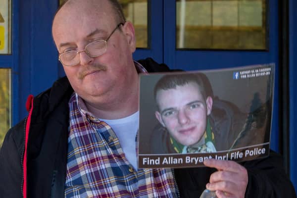 Allan Bryant Snr with a picture of his missing son at a protest outside Fife Police HQ in Glenrothes in 2016 (Pic: Steve Brown)