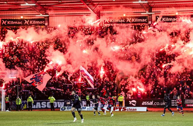 Rangers fans light up the Bob Shankly Stand at Dens Park with pyro during the recent cinch Premiership match against Dundee.  (Photo by Rob Casey / SNS Group)