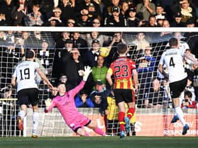 Aaron Muirhead converts an early penalty to put Ayr United ahead against Partick Thistle.