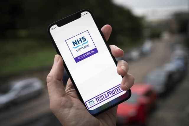A smartphone displaying the NHS Scotland Covid status app. Picture date: Monday October 11, 2021.