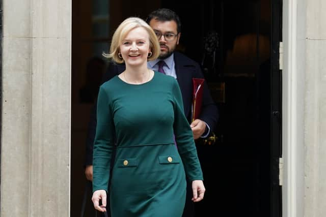 Prime Minister Liz Truss departs 10 Downing Street, Westminster, London, to attend Prime Minister's Questions at the Houses of Parliament. Picture date: Wednesday October 12, 2022.