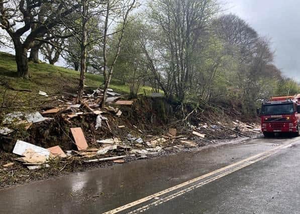 Debris lies strewn across the road (Photo: Traffic Scotland).
