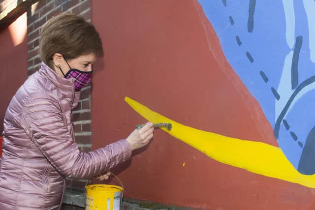 Nicola Sturgeon at the Barrowlands in Glasgow to see the Shuggie Bain Mural painted by artists Erin Bradley-Scott, Chelsea Frew and Kat Louden from the Cobalt Collective.