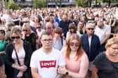 Members of the public take part in a vigil near to the scene in Hart Street, Southport, where three children died and eight were injured in a "ferocious" knife attack during a Taylor Swift event at a dance school on Monday.
