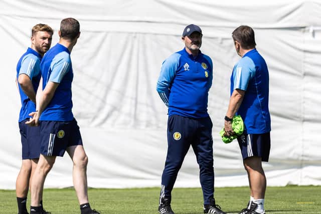 GLASGOW, SCOTLAND - JUNE 16: Scotland manager Steve Clarke with his coaching staff during a Scotland training session.