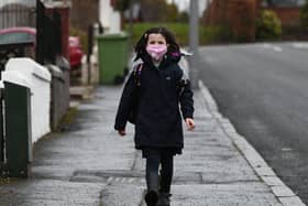 A child wearing a face mask.