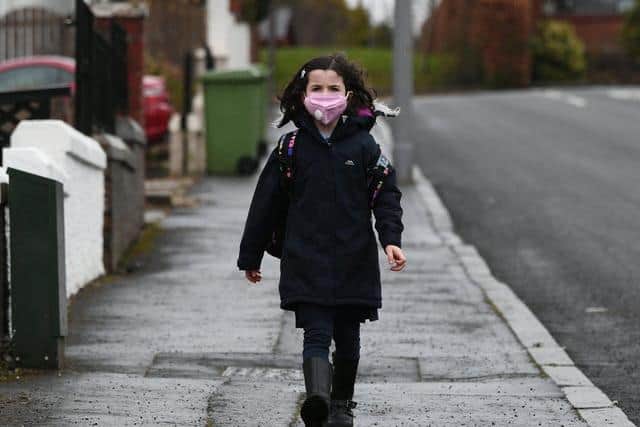 A child wearing a face mask.