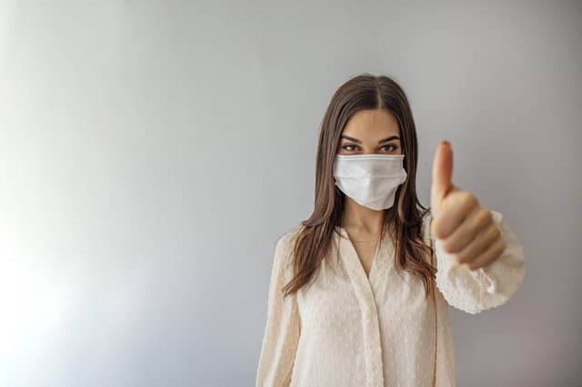 Wearing a face mask can dramatically cut rates of coronavirus infection (Picture: PA)