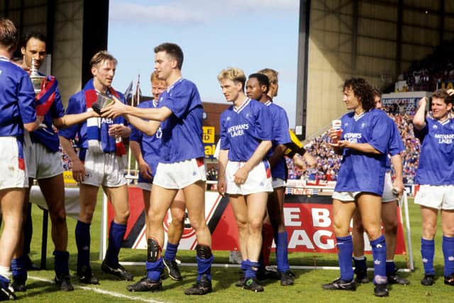 Rangers celebrate winning the 1990/1991 Premier League title on the last day of the season after a dramatic 2-0 win over Aberdeen